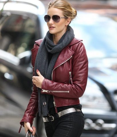 Rosie Huntington-Whiteley wearing sunglasses talking on a cell phone