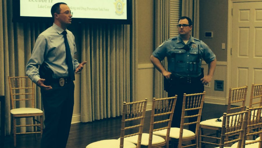 Detective Grum (left) works as the resource officer for the Lake Forest Police Department.