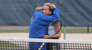 Kiley Rabjohns hugs her coach, Denise Murphy, after winning her second straight Girls 2A Singles Title.