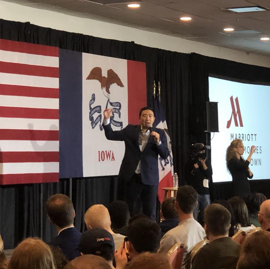 Entrepreneur Andrew Yang addresses the crowd at a rally in Des Moines Saturday night. He was energetic, knowledgeable, and confident in his ability to win the Democratic nomination and the general election by making America think harder.