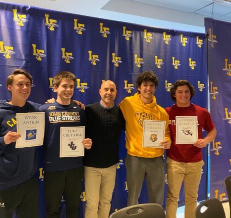 Ryan Antrim, Luke Chlystek, Michael Vallone, and Anthony Ranallo all pose with head coach Ray Del Fava following signing their NLIs on Wednesday, Feb 5.