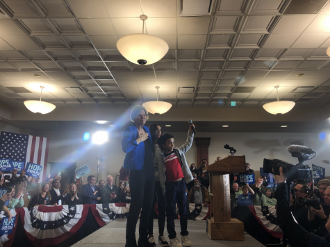 Senator Elizabeth Warren (D-Mass) and her grandchildren pose for pictures before Ms Warrens post-caucus speech. The speech ran for 15 minutes and centered on hope and keeping the campaign going.