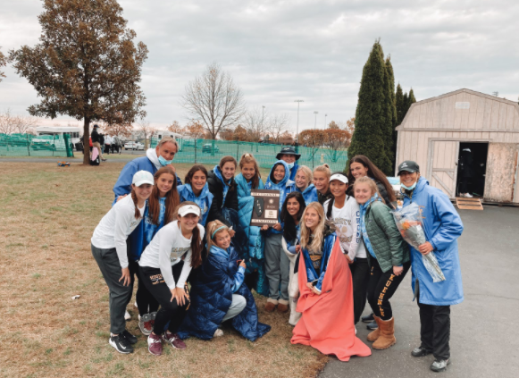 The Varsity Girls Tennis team after winning this years Sectionals.