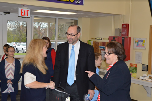 A towering presence, Simeck was unmistakable visiting District 67 schools.
