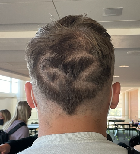 More than a Haircut: Mohawks Signify Football Team's Unity and Dedication –  The Forest Scout