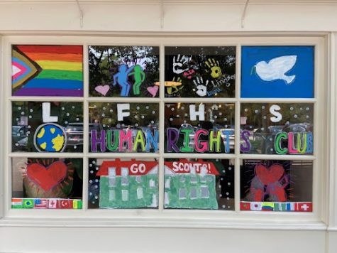 The Human Rights Clubs Homecoming mural, which featured a rainbow pride flag, was removed soon after the club completed it.