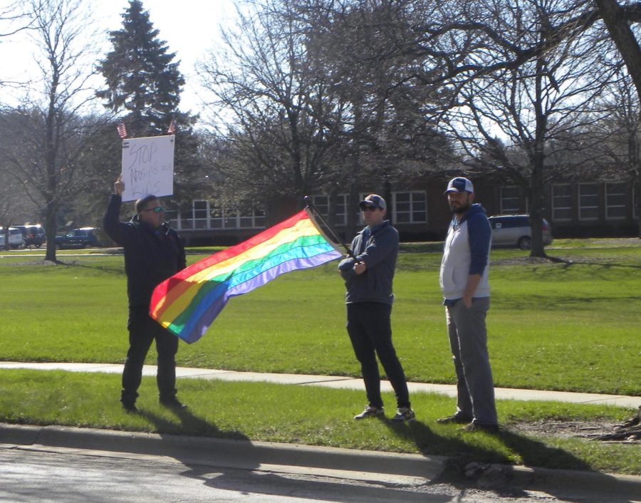 Counter protestors stand off in front of Deerpath Middle School Thursday. 