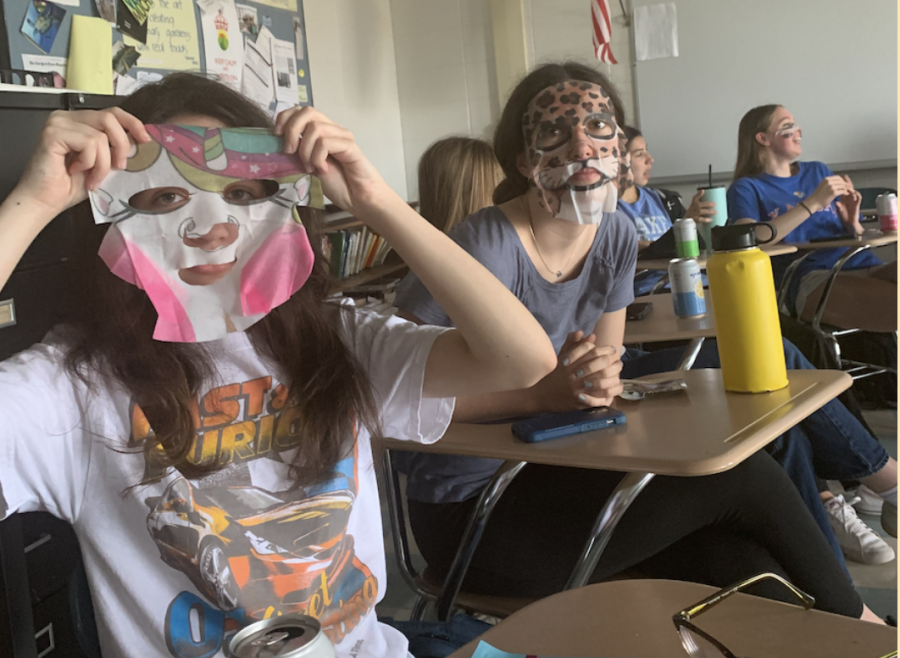 Juniors+Sofia+Davis+and+Rachel+Kaus+with+animal+print+face+masks.+