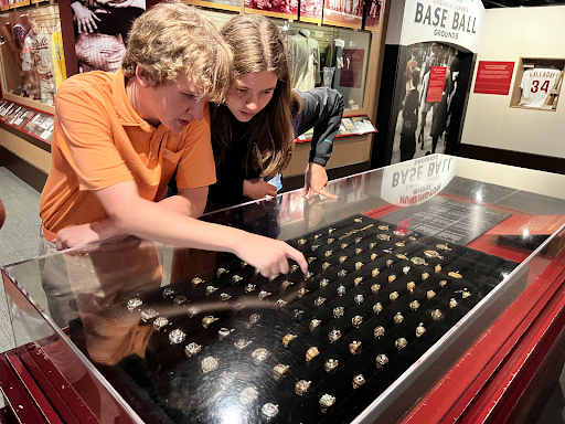 Janel Sharman and Henry Thomas admiring the Hall of Fame rings