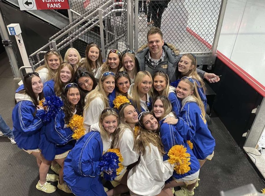 The 2022 Dance team at the annual Pucks and Poms game