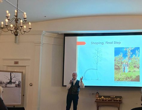 Dennis Downes presenting at the History Center of Lake Forest-Lake Bluff, featuring the final stages of Trail Marker Trees