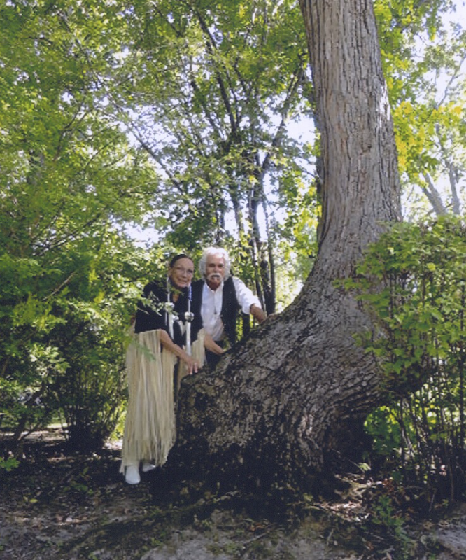 Dennis Downes and Hilda "Little Fawn" Williams at a Trail Marker Tree in Highland Park.