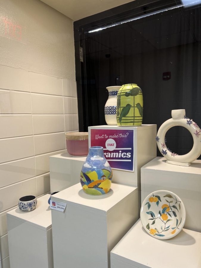 Some of the ceramic pieces displayed in the art hallway made by a variety of students. 
