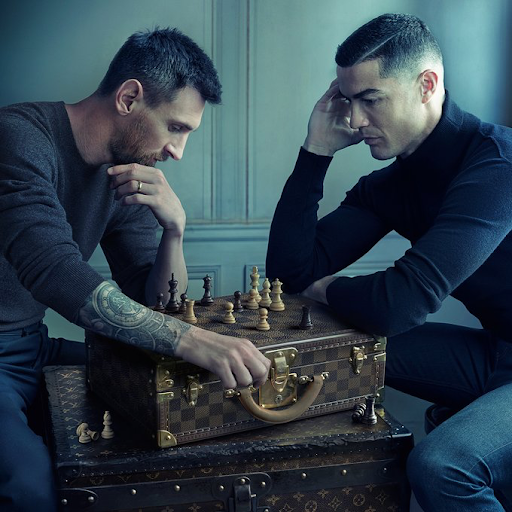 Lionel Messi and Christiano Ronaldo playing chess in a Louis Vuitton Ad--the most liked photo on instagram of 2022
