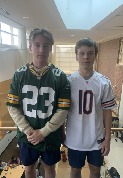 Packers fan Ben Arsenault and Bears fan Elliott Zelken representing their teams jerseys. 