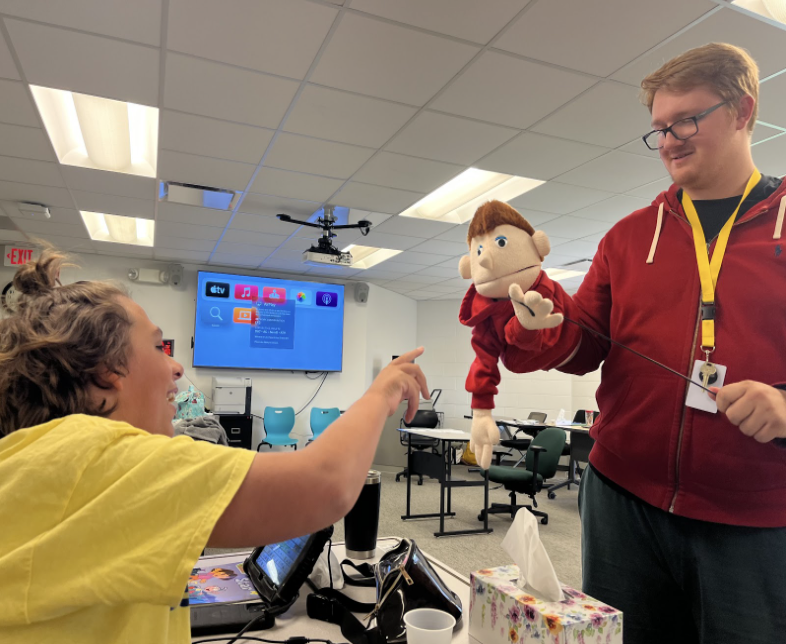 Mini Mr. Taylor (left) and Mr. Taylor (right) visiting transition program students
Courtesy of Mr. Taylor