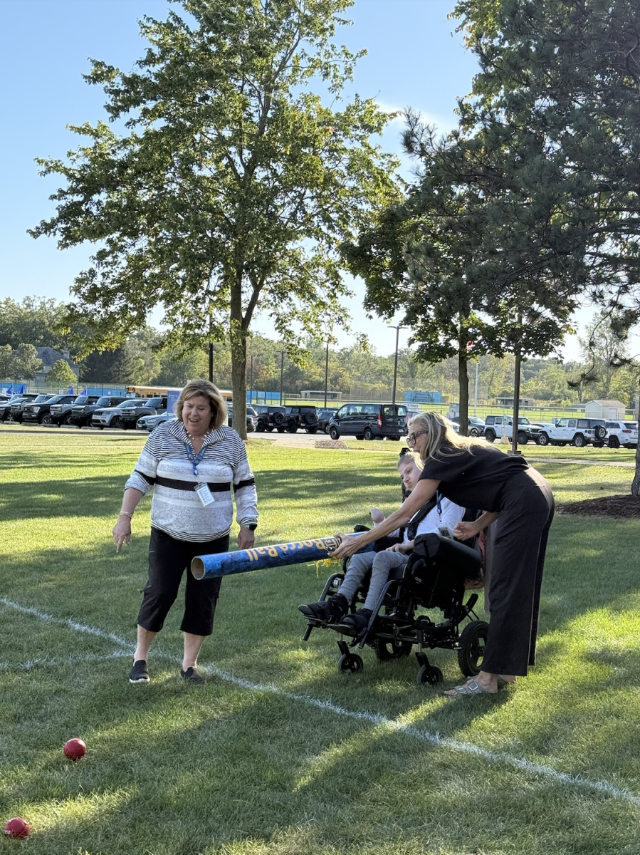 Mrs. Melissa Doucette playing bocce play with a student.
Photo Courtesy of Addington Leahy