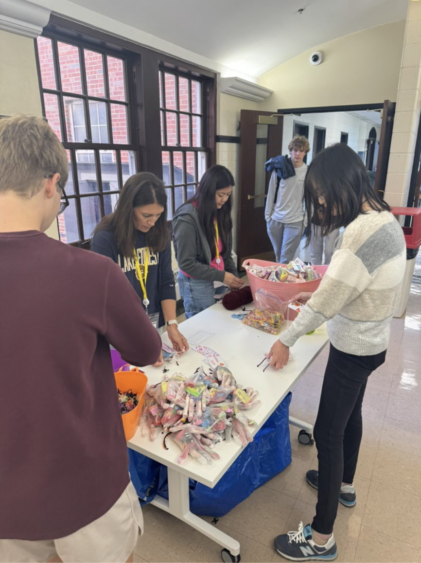 Students, parents, and staff participating in the service day.
Photo Courtesy of Lyla Carney.