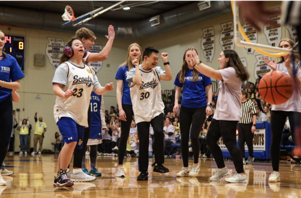 The Scouts celebrate a basket at last year's ELS game. This year, the schedule has been adjusted to allow all students to attend the annual tradition.