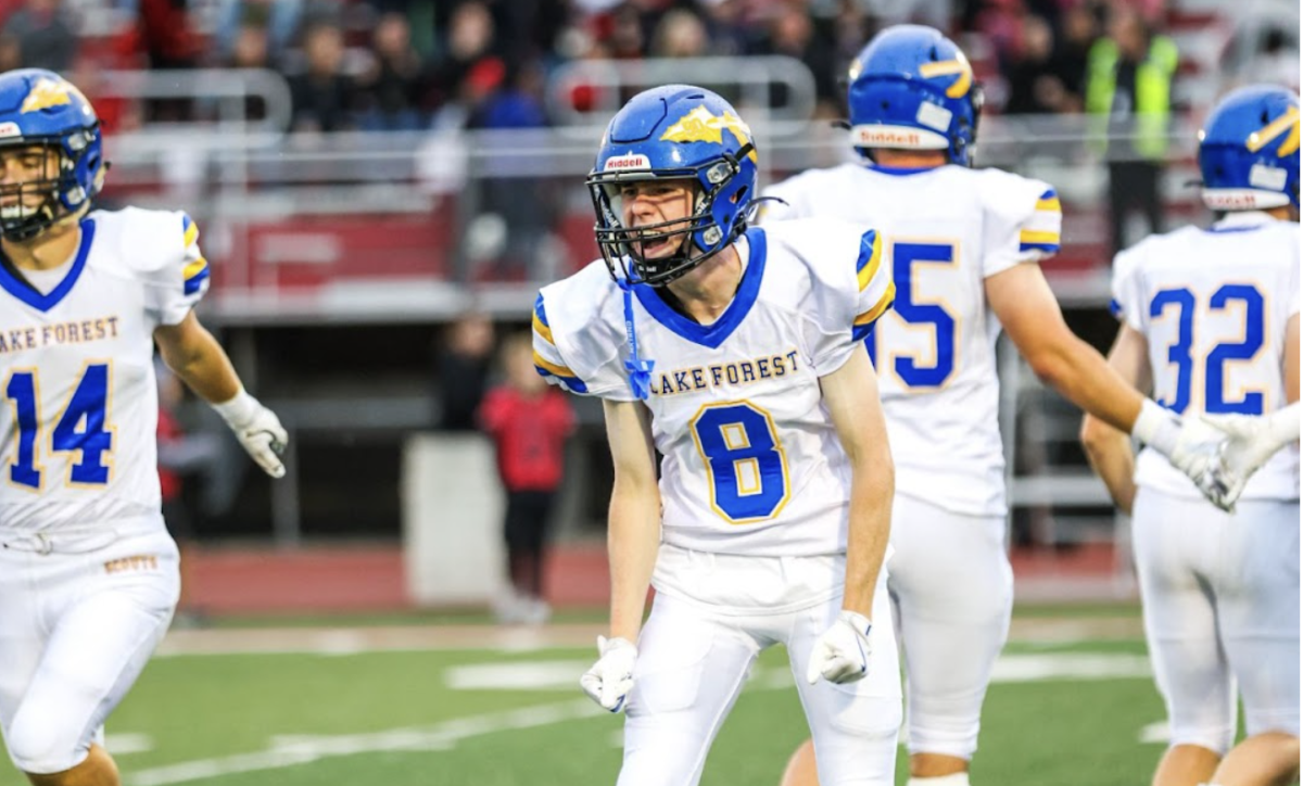 Junior Jack Burger playing football.