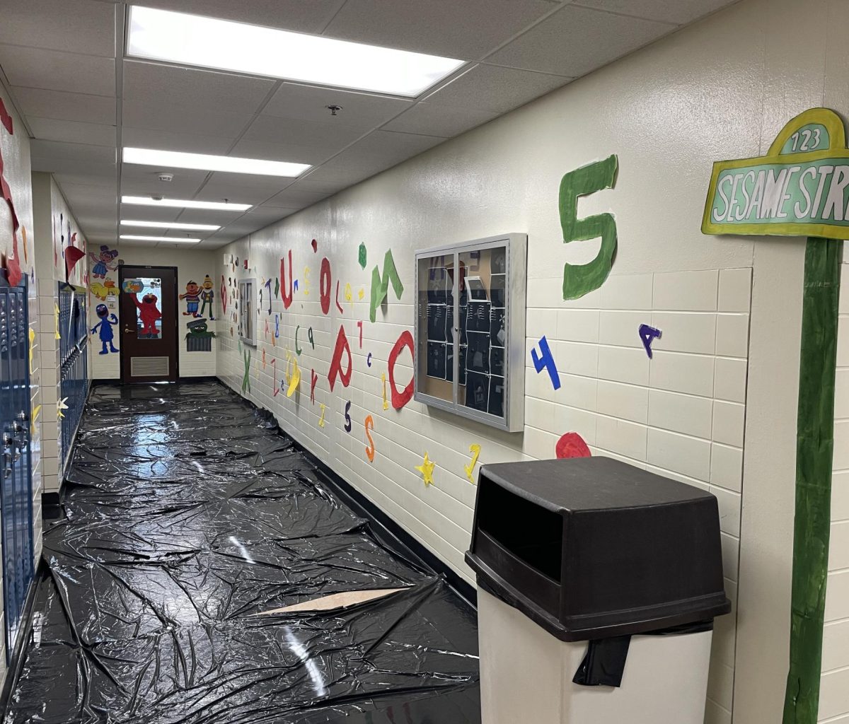 Mrs. Leah Everett & Mr. Joe Harmsen won last year's award for the "funniest" door!