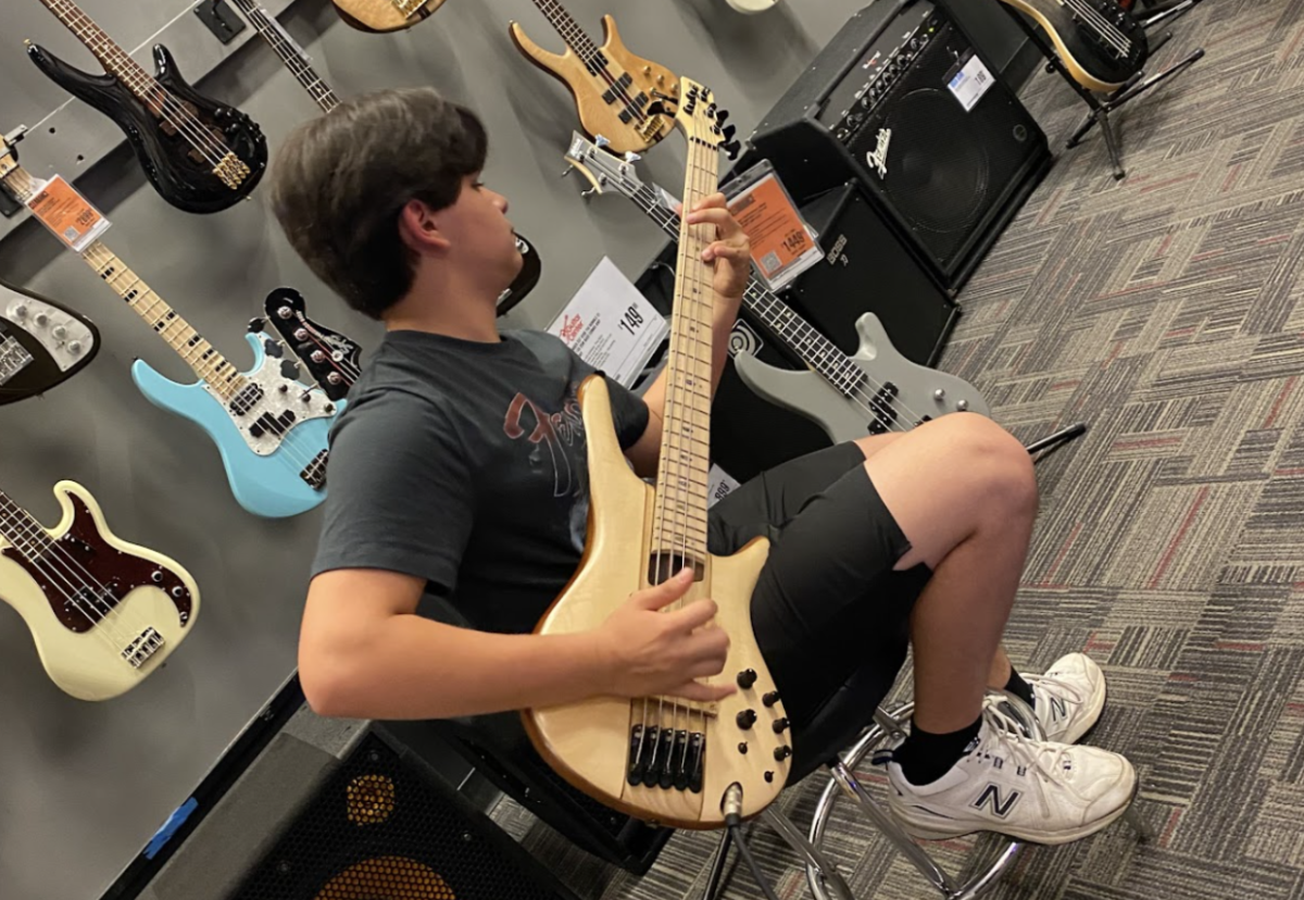 Nick Alarcon playing guitar
