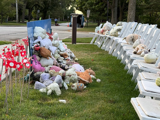 Photo depicting the temporary memorial at Am Shalom, decorated by the community with stuffed as symbols of hope (Courtesy of Rabbi Steven Lowenstein).