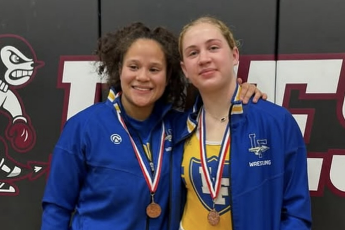 Photo courtesy of @lfhsgirlswrestling Instagram. Bree Hirsch (left) and Mirabelle Duboeuf (right)
