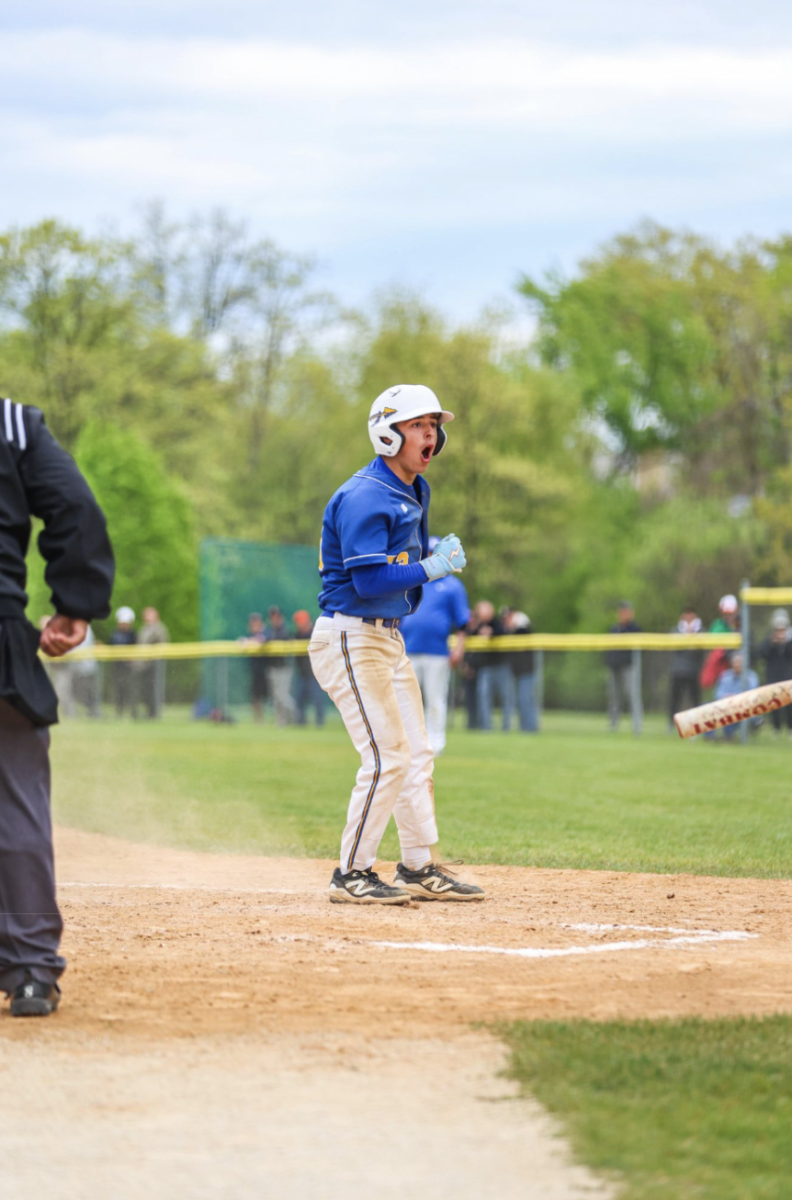 Sophomore Owen Koehnemann got on home base after hitting a triple to get three runs in before him. 