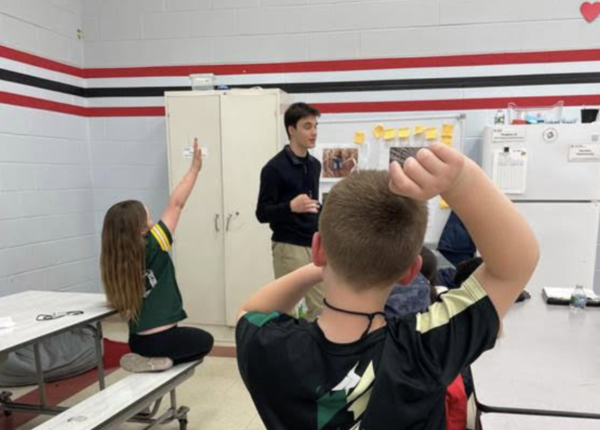 Ratin teaching. Photo courtesy of Ben Ratin.