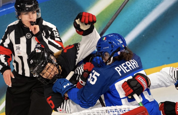 Hiller officiating the matchup between Italy and Japan. Photo courtesy of Samantha Hiller.